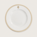 Assiette creuse blanche et dorée