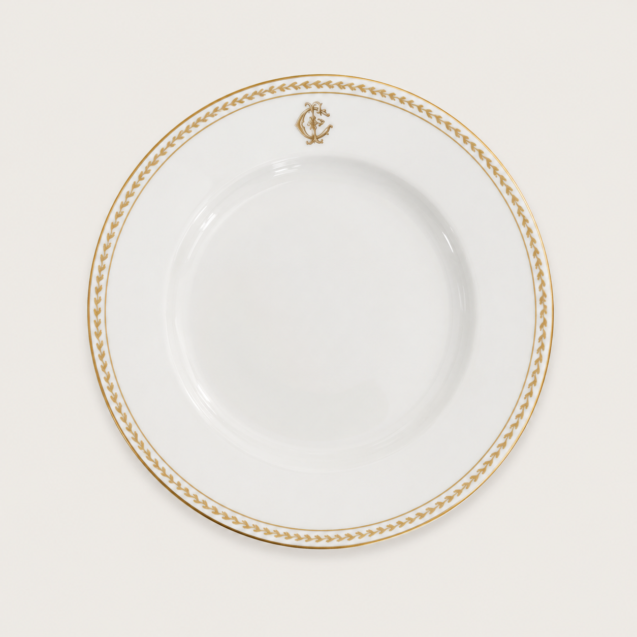 Assiette creuse blanche et dorée