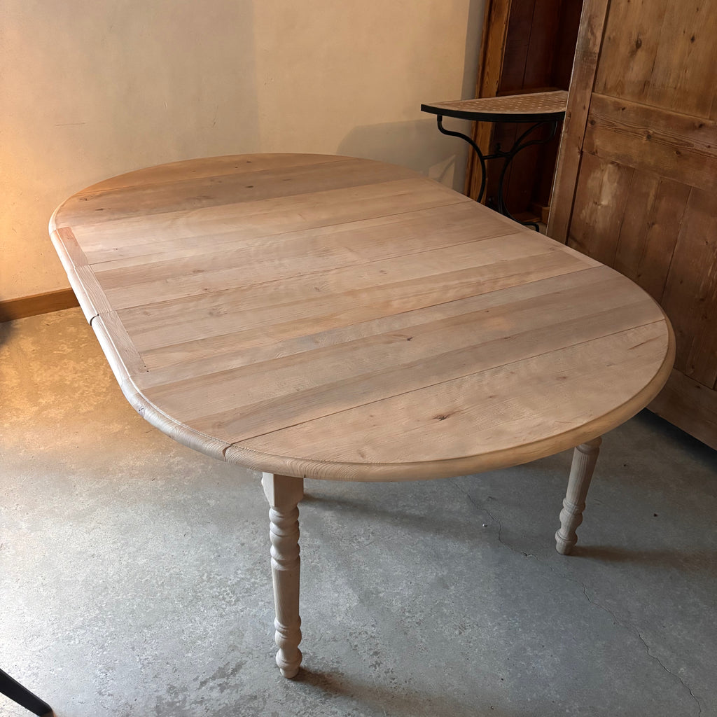Table ronde à allonges