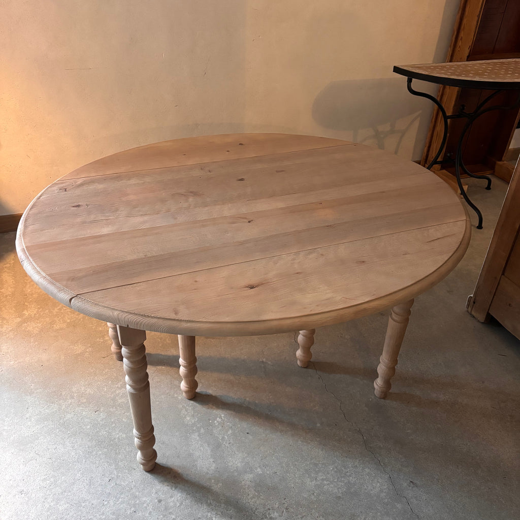 Table ronde à allonges
